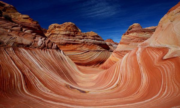 KenhSinhVien.Net-110921kpdulichthe-wave-is-on-the-slopes-of-the-coyote-buttes-which-are-in-turn-located-in-the-paria-canyonvermilion-cliffs-wilderness-on-the-colorado-plateau-arizona.jpg